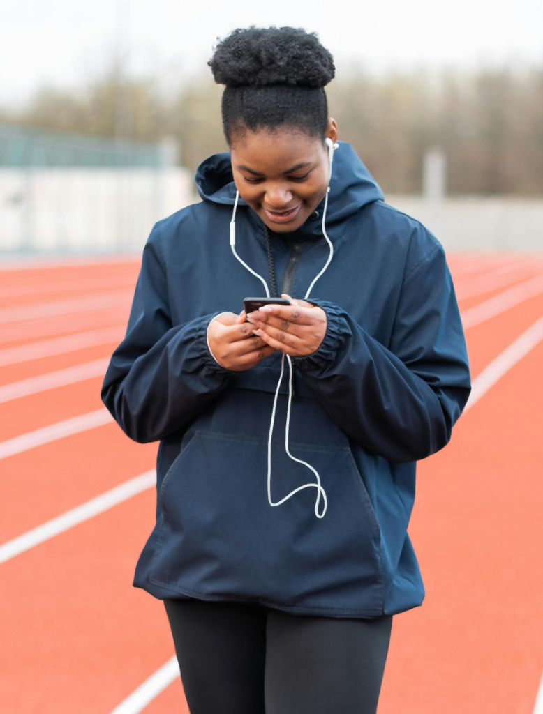 Girl Texting on Running Track