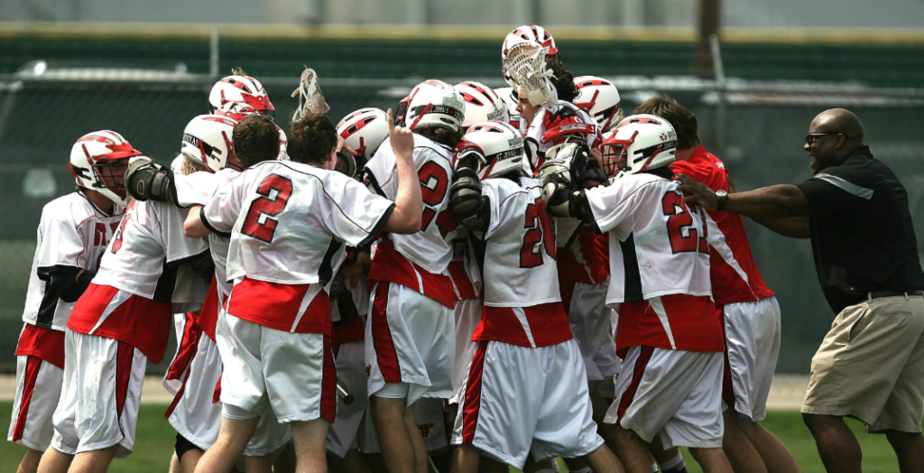 Sports team hugging