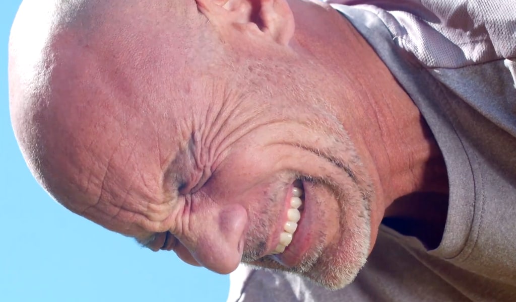A man in pain.