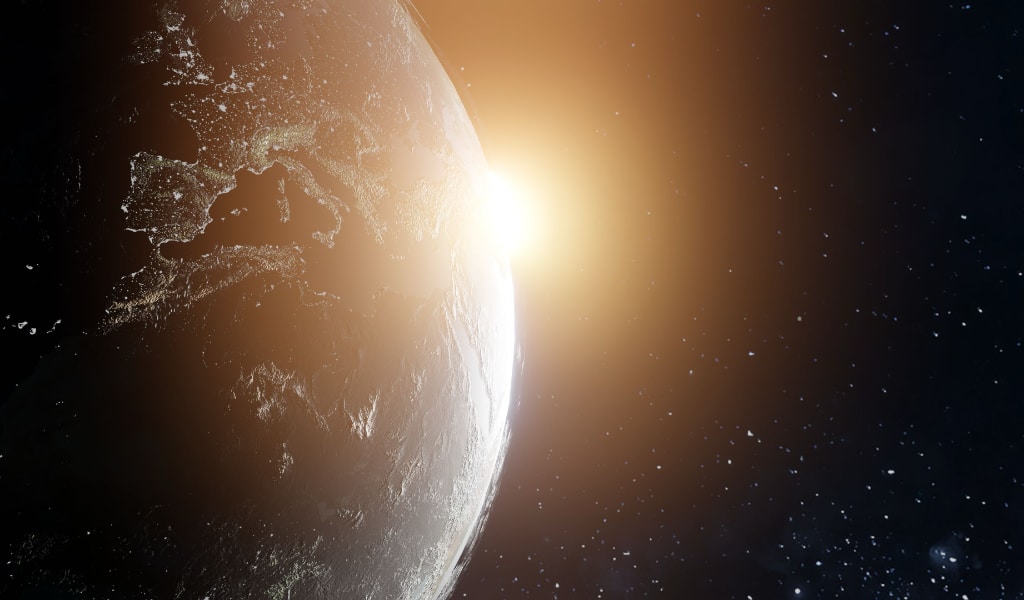 Earth with sun glow.